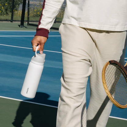 Owala FreeSip Insulated Stainless Steel Water Bottle with Straw for Sports and Travel, BPA-Free, 40-oz, Shy Marshmallow 🍁 All In One Marketplace Canada