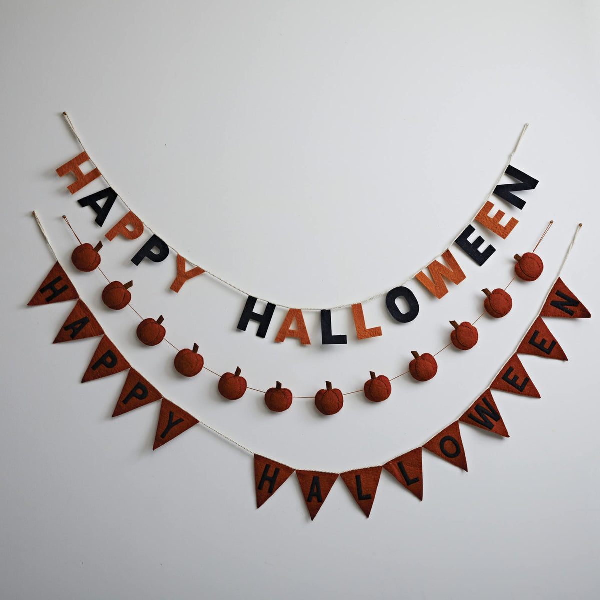 Creative Co-Op 72"L Handmade Wool Felt Pennant Banner "Happy Halloween", Orange Color & Black