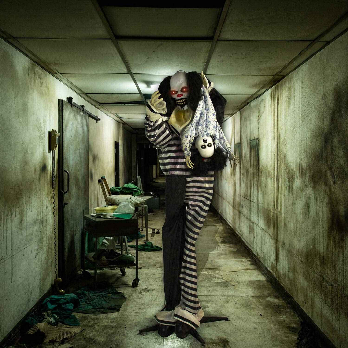 Haunted Hill Farm Life-Size Animatronic Scary Talking Clown with Doll, Motion, Touch Activated Lights, and Sounds, Indoor or Covered Outdoor Halloween Decorations, Battery Operated Halloween Props