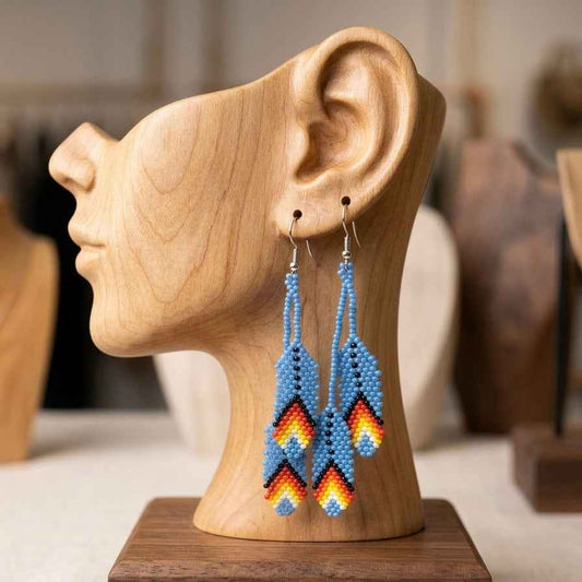 OldTribes™  light blue feather earrings